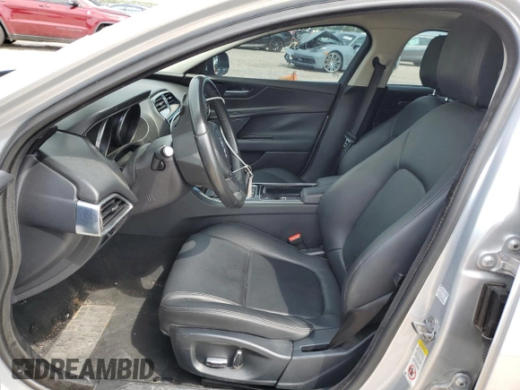 2019 Jaguar XE 25t with VIN SAJAR4FX9KCP48304, listed as a Copart auction lot 72591524 with 79,917 mi miles and Salvage Title. Bid and sale history available at carsss.com. Image 7.