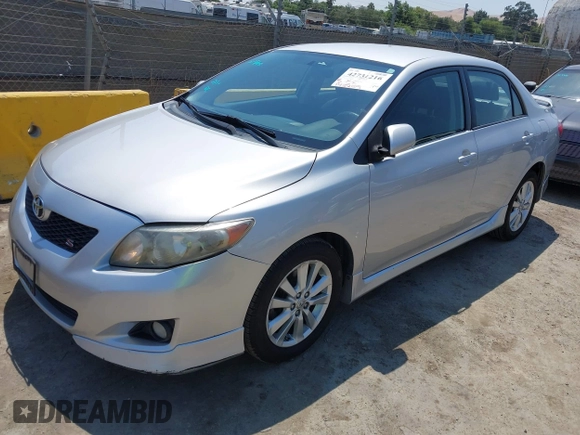 2010 Toyota Corolla z VIN 2T1BU4EE3AC500511, wystawiony jako IAAI lot #42731216 z przebiegiem 143 255 mil mil oraz . Historia ofert i sprzedaży dostępna na DreamBid. Obrazek 2.