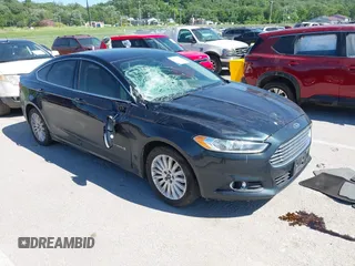 2014 Ford Fusion SE Hybrid with VIN 3FA6P0LU4ER233963, listed as a IAAI auction lot 42315109 with 131,565 mi miles and . Bid and sale history available at DreamBid. Image 1.