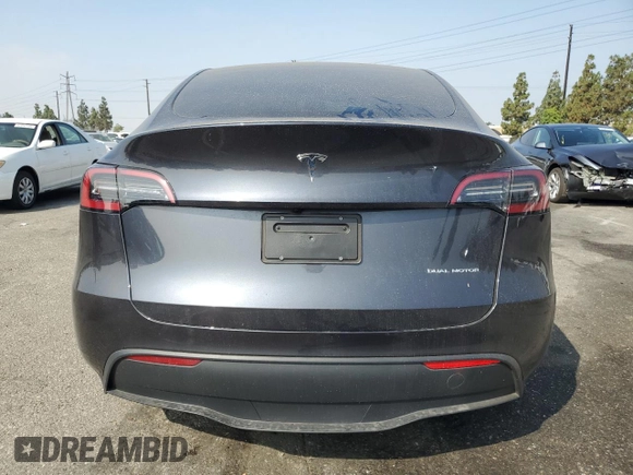 2024 Tesla Model Y Long Range with VIN 7SAYGDEE1RA266653, listed as a Copart auction lot 62277865 with 8,189 mi miles and Salvage title. Bid and sale history available at DreamBid. Image 6.