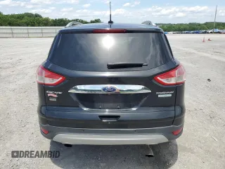 2014 Ford Escape Titanium с VIN 1FMCU0J9XEUA27152, выставлен на аукционе Copart как лот 60246715 с пробегом 182 550 миль миль и Чистый • Clean title. История ставок и продаж доступна на DreamBid. Изображение 6.