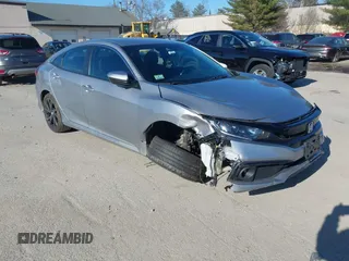 2019 Honda Civic Sport with VIN 2HGFC2F8XKH602463, listed as a IAAI auction lot 41966052 with 95,416 mi miles and . Bid and sale history available at DreamBid. Image 1.