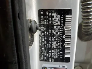 2014 Kia Sorento LX z VIN 5XYKTCA65EG488917, wystawiony jako Copart lot #57613445 z przebiegiem 180 621 mil mil oraz Szkoda całkowita • Salvage title. Historia ofert i sprzedaży dostępna na DreamBid. Obrazek 13.