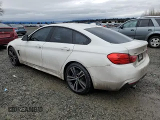 2015 BMW 4 Series 435i xDrive with VIN WBA4B3C56FD669599, listed as a Copart auction lot 43461545 with 186,082 mi miles and Salvage title. Bid and sale history available at DreamBid. Image 2.