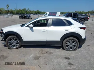 2024 Mazda CX-30 S Carbon Edition with VIN 3MVDMBCM2RM719131, listed as a IAAI auction lot 42265739 with 8,470 mi miles and . Bid and sale history available at DreamBid. Image 15.