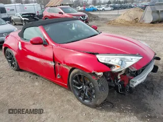 2015 Nissan 370Z Touring z VIN JN1AZ4FH3FM430561, wystawiony jako IAAI lot #41820623 z przebiegiem 20 022 mil mil oraz . Historia ofert i sprzedaży dostępna na DreamBid. Obrazek 1.