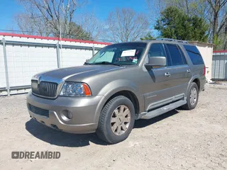 2003 Lincoln Navigator Ultimate with VIN 5LMFU27R43LJ47108, listed as a IAAI auction lot 41711964 with 127,250 mi miles. Bid and sale history available at carsss.com. Image 2.