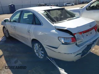 2007 Hyundai Azera SE z VIN KMHFC46F57A210341, wystawiony jako IAAI lot #41729427 z przebiegiem 113 301 mil mil oraz . Historia ofert i sprzedaży dostępna na DreamBid. Obrazek 3.