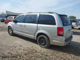 2010 Chrysler Town & Country LX with VIN 2A4RR4DE2AR113041, listed as a IAAI auction lot 41912924 with 200,143 mi miles. Bid and sale history available at carsss.com. Image 3.