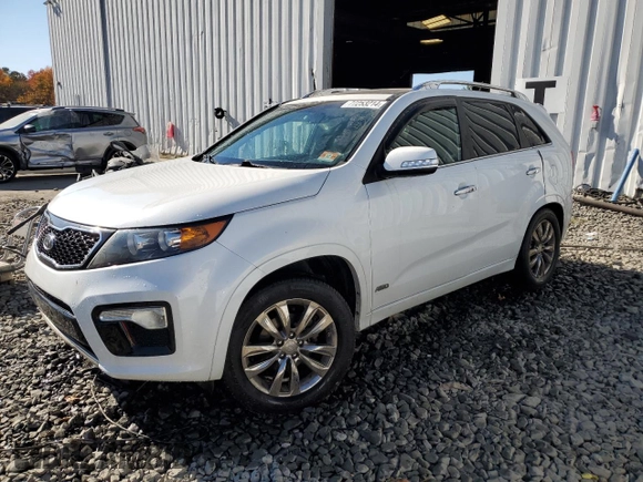 2012 Kia Sorento SX with VIN 5XYKWDA29CG255081, listed as a Copart auction lot 77253214 with 135,156 mi miles and Salvage Title. Bid and sale history available at carsss.com. Image 1.
