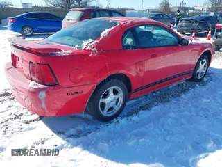 2002 Ford Mustang Standard with VIN 1FAFP40432F223851, listed as a IAAI auction lot 41639783 with 131,758 mi miles. Bid and sale history available at carsss.com. Image 4.