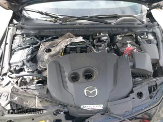 2021 Mazda 3 Premium Plus z VIN JM1BPBNY2M1403797, wystawiony jako IAAI lot #42031637 z przebiegiem Nie podano mil oraz . Historia ofert i sprzedaży dostępna na DreamBid. Obrazek 10.