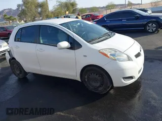 2009 Toyota Yaris with VIN JTDKT903795263620, listed as a IAAI auction lot 41100398 with 66,384 mi miles. Bid and sale history available at carsss.com. Image 1.