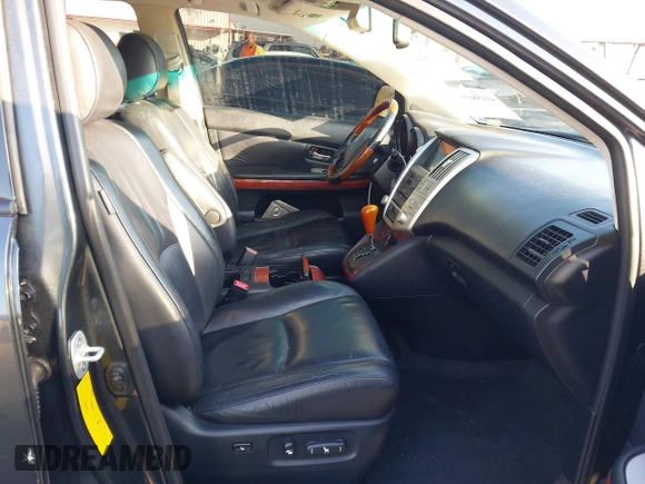 2007 Lexus RX 400h z VIN JTJGW31U772004557, wystawiony jako IAAI lot #41458659 z przebiegiem 193 678 mil mil oraz . Historia ofert i sprzedaży dostępna na DreamBid. Obrazek 5.