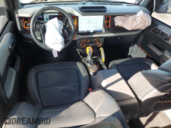 2022 Ford Bronco with VIN 1FMEE5DH1NLB82717, listed as a Copart auction lot 83230614 with 21,593 mi miles and Salvage Title. Bid and sale history available at DreamBid. Image 8.