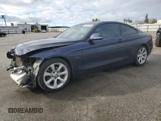 2015 BMW 4 Series 428i with VIN WBA3N7C53FK225487, listed as a Copart auction lot 44398325 with 148,400 mi miles and Salvage Title. Bid and sale history available at carsss.com. Image 1.