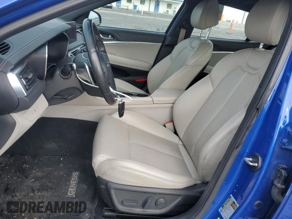 2022 Genesis G70 2.0T with VIN KMTG34TA9NU095855, listed as a Copart auction lot 86511574 with 65,619 mi miles and Salvage Title. Bid and sale history available at DreamBid. Image 7.