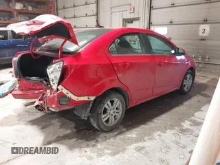 2014 Chevrolet Sonic LT with VIN 1G1JC5SH2E4214489, listed as a IAAI auction lot 41650289 with 93,388 mi miles and . Bid and sale history available at DreamBid. Image 4.