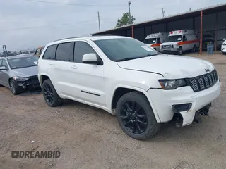 2017 Jeep Grand Cherokee Altitude with VIN 1C4RJEAG9HC736362, listed as a IAAI auction lot 41437181 with 125,346 mi miles and . Bid and sale history available at DreamBid. Image 1.