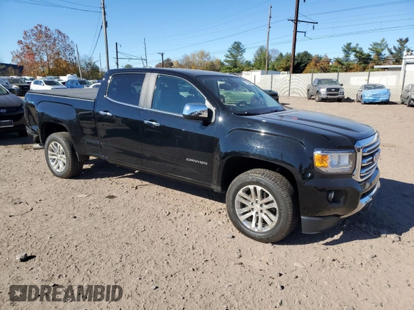 2016 GMC Canyon 4WD SLT with VIN 1GTP6DE11G1357147, listed as a Copart auction lot 77835344 with 106,890 mi miles and Salvage Title. Bid and sale history available at carsss.com. Image 4.
