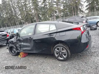 2022 Toyota Prius L Eco with VIN JTDKAMFU2N3154674, listed as a IAAI auction lot 41977505 with 61,552 mi miles and . Bid and sale history available at DreamBid. Image 15.