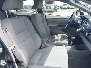 2010 Honda Insight EX with VIN JHMZE2H74AS040110, listed as a IAAI auction lot 42643669 with 189,531 mi miles and . Bid and sale history available at DreamBid. Image 5.