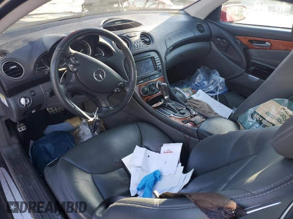2005 Mercedes-Benz SL 500 z VIN WDBSK75F75F094745, wystawiony jako Copart lot #43600645 z przebiegiem Nie podano mil oraz Szkoda całkowita • Salvage title. Historia ofert i sprzedaży dostępna na DreamBid. Obrazek 8.