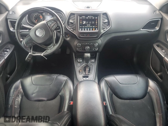 2019 Jeep Cherokee Trailhawk with VIN 1C4PJMBX9KD183116, listed as a Copart auction lot 58518265 with 124,258 mi miles and Salvage title. Bid and sale history available at DreamBid. Image 8.