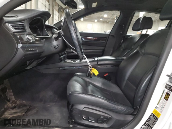 2015 BMW 7 Series 750i xDrive with VIN WBAYB6C54FD965787, listed as a Copart auction lot 89061355 with 104,633 mi miles and Salvage Title. Bid and sale history available at carsss.com. Image 7.