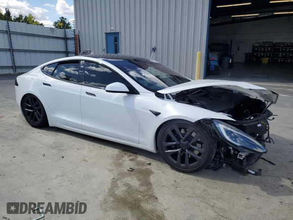 2022 Tesla Model S z VIN 5YJSA1E57NF474679, wystawiony jako Copart lot #56608285 z przebiegiem Nie podano mil oraz Szkoda całkowita • Salvage title. Historia ofert i sprzedaży dostępna na DreamBid. Obrazek 4.