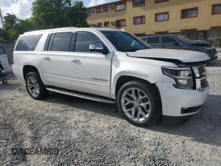 2017 Chevrolet Suburban Premier с VIN 1GNSCJKC6HR384877, выставлен на аукционе Copart как лот 58980085 с пробегом 85 231 миль миль и Списание • Salvage title. История ставок и продаж доступна на DreamBid. Изображение 4.