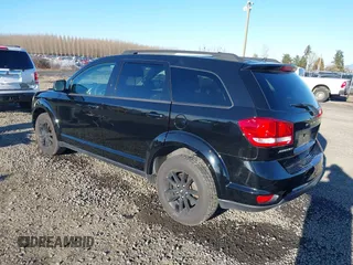 2019 Dodge Journey SE with VIN 3C4PDCBB5KT841465, listed as a IAAI auction lot 41558770 with 84,090 mi miles and . Bid and sale history available at DreamBid. Image 3.