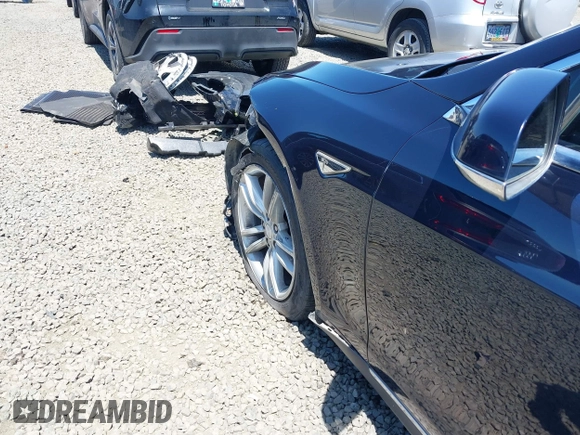 2014 Tesla Model S 60 with VIN 5YJSA1H18EFP31969, listed as a IAAI auction lot 42312485 with 90,043 mi miles and . Bid and sale history available at DreamBid. Image 20.