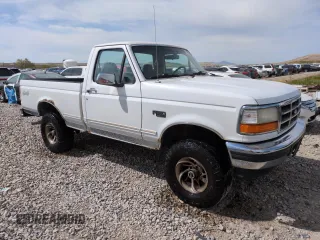 1996 Ford F-150 Special with VIN 1FTEF14N8TLB29817, listed as a Copart auction lot 52809335 with 293,859 mi miles and Salvage Title. Bid and sale history available at carsss.com. Image 4.