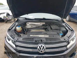 2012 Volkswagen Tiguan SE z VIN WVGBV7AX0CW558863, wystawiony jako IAAI lot #42285870 z przebiegiem 158 521 mil mil oraz . Historia ofert i sprzedaży dostępna na DreamBid. Obrazek 10.