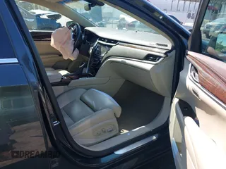 2014 Cadillac XTS Luxury z VIN 2G61M5S37E9211547, wystawiony jako IAAI lot #42373128 z przebiegiem 146 354 mil mil oraz . Historia ofert i sprzedaży dostępna na DreamBid. Obrazek 5.