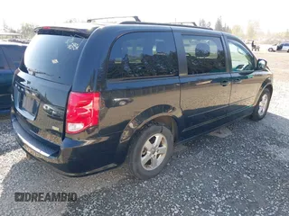 2012 Dodge Grand Caravan SXT with VIN 2C4RDGCG2CR319651, listed as a IAAI auction lot 42097594 with 155,521 mi miles and . Bid and sale history available at DreamBid. Image 4.