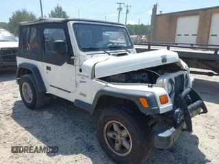 1998 Jeep Wrangler Sport with VIN 1J4FY19S2WP721248, listed as a IAAI auction lot 42553613 with 186,494 mi miles and . Bid and sale history available at DreamBid. Image 1.