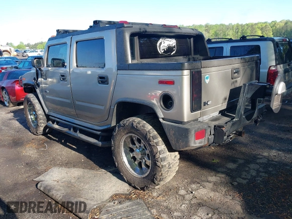 2005 Hummer H2 SUT with VIN 5GRGN22UX5H106653, listed as a IAAI auction lot 42015559 with 180,519 mi miles. Bid and sale history available at carsss.com. Image 3.