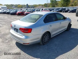 2015 Volkswagen Jetta S with VIN 3VW2K7AJ5FM404207, listed as a IAAI auction lot 40378056 with 110,867 mi miles and . Bid and sale history available at DreamBid. Image 4.