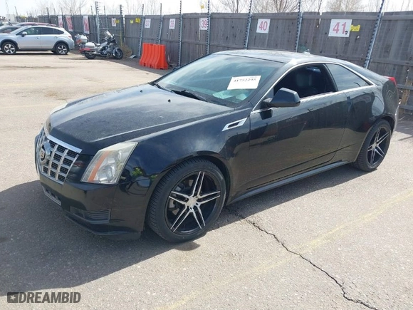 2012 Cadillac CTS Coupe with VIN 1G6DC1E33C0158695, listed as a IAAI auction lot 41752295 with 150,887 mi miles. Bid and sale history available at carsss.com. Image 2.