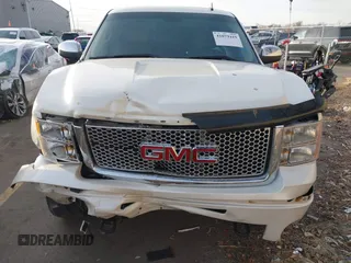 2011 GMC Sierra 1500 Denali z VIN 3GTP2XE20BG152905, wystawiony jako IAAI lot #41079419 z przebiegiem 158 192 mil mil oraz . Historia ofert i sprzedaży dostępna na DreamBid. Obrazek 13.