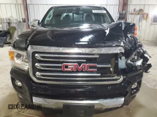 2016 GMC Canyon 2WD SLT with VIN 1GTG5DE39G1100516, listed as a Copart auction lot 87648455 with 243,815 mi miles and Salvage Title. Bid and sale history available at carsss.com. Image 5.