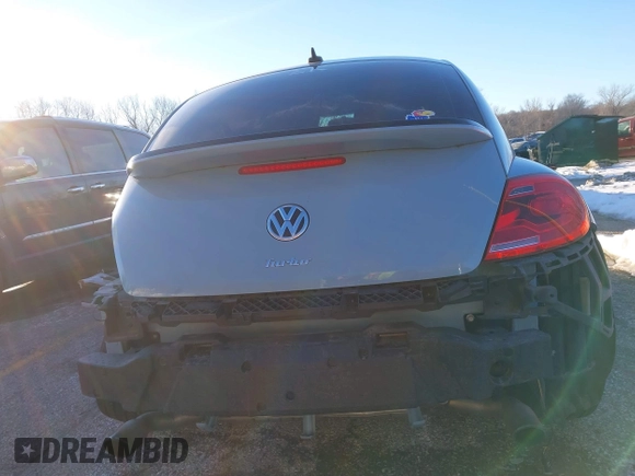 2014 Volkswagen Beetle Turbo R-Line with VIN 3VWVT7AT9EM661347, listed as a IAAI auction lot 41336295 with 61,068 mi miles and . Bid and sale history available at DreamBid. Image 16.