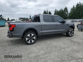 2023 Ford F-150 Lightning Pro with VIN 1FT6W1EV9PWG25278, listed as a Copart auction lot 60293095 with 24,450 mi miles and Salvage title. Bid and sale history available at DreamBid. Image 3.
