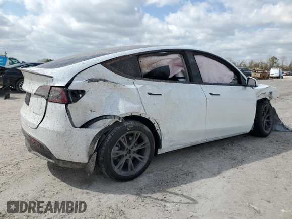 2024 Tesla Model Y Long Range with VIN 7SAYGDEE2RA335818, listed as a Copart auction lot 48821475 with 4,415 mi miles and Salvage Title. Bid and sale history available at DreamBid. Image 3.