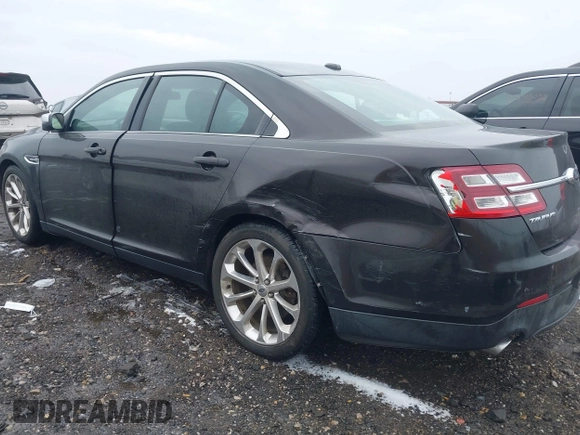 2013 Ford Taurus Limited with VIN 1FAHP2F82DG192581, listed as a IAAI auction lot 41490122 with 196,515 mi miles. Bid and sale history available at carsss.com. Image 3.