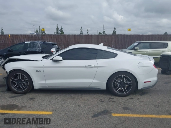 2021 Ford Mustang GT with VIN 1FA6P8CF5M5115597, listed as a IAAI auction lot 42142619 with 101,687 mi miles and . Bid and sale history available at DreamBid. Image 13.