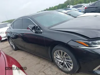 2023 Lexus ES 350 Ultra Luxury with VIN 58AFZ1B17PU150139, listed as a IAAI auction lot 42091947 with 35,216 mi miles and . Bid and sale history available at DreamBid. Image 13.
