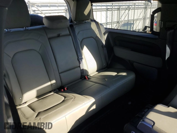 2023 Land Rover Defender S with VIN SALEJ6EX6P2147281, listed as a Copart auction lot 84217414 with 27,758 mi miles and Salvage title. Bid and sale history available at DreamBid. Image 11.